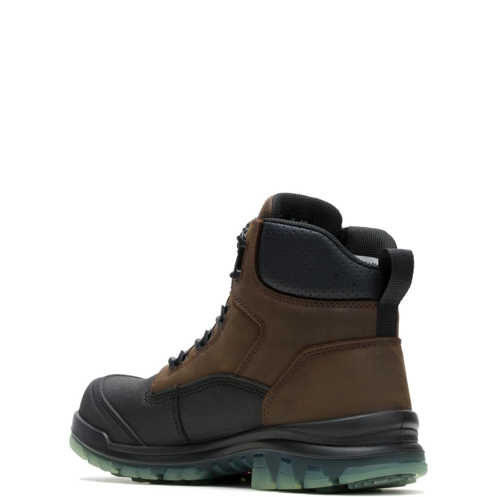 Brown and black hiking boot on a white background